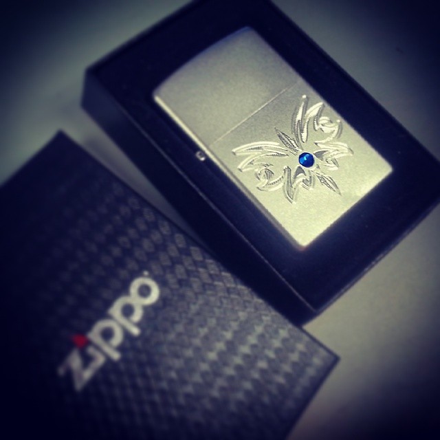 A very unique lighter for a lovely lady.. This beautiful Zippo with Wi