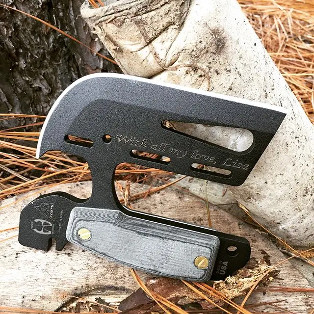 TOPS ATAX Hand Axe TPATAX01 engraved with love. Made of carbon steel this is not only an axe but also a knife,skinner, wire cutter, range finder, compass, inclinometer, click, wrench, hammer, rescue tool, fire bow beating, arrow launcher, field level, and survival kit holder! DVD and kydex case too.
#TOPS #ATAX #axe #wirecutter #survivalgear #TPATAX01