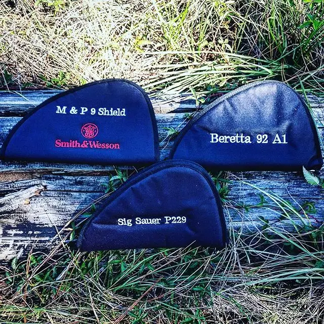 Cushioned black pistol case embroidered just for you!This customer found a nice way to organize his guns and keep them safe  #embroidery #pistol #case #embroideredcase #customembroidery #organizedartillery