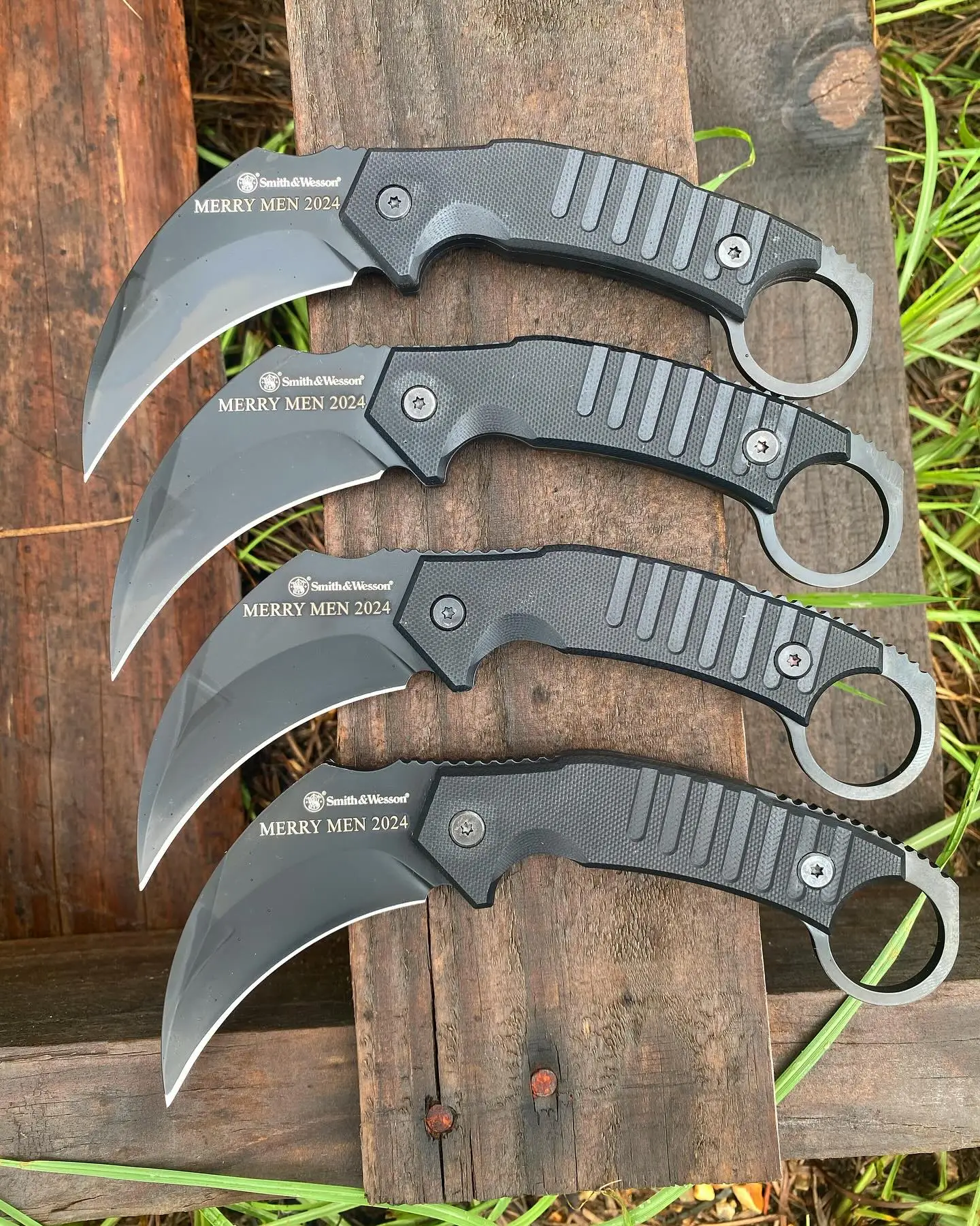 Smith and Wesson Extreme Ops Fixed Blade Karamb SW1208412- just engraved for these four Merry Men!! I am sure this gift will make them all merry!! The Karambit blade is 3.13” with black oxide coating.  Handle is made of G10 scales and length is 7” overall-comes with a black ABS belt sheath. #SW1208412 #karamb #karambitblade #absbelt