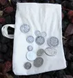 Canvas Bag of Survival Money Featuring Silver Coins from a Bygone Era